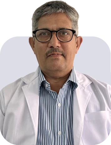 Portrait of Dr. Venkatesh in a white coat.