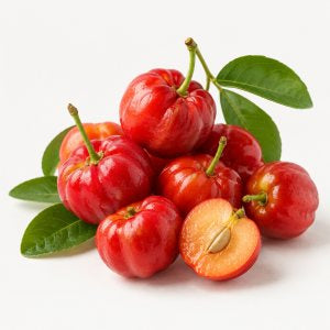 A handful of acerola cherries, one halved
